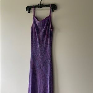 Purple patterned dress.